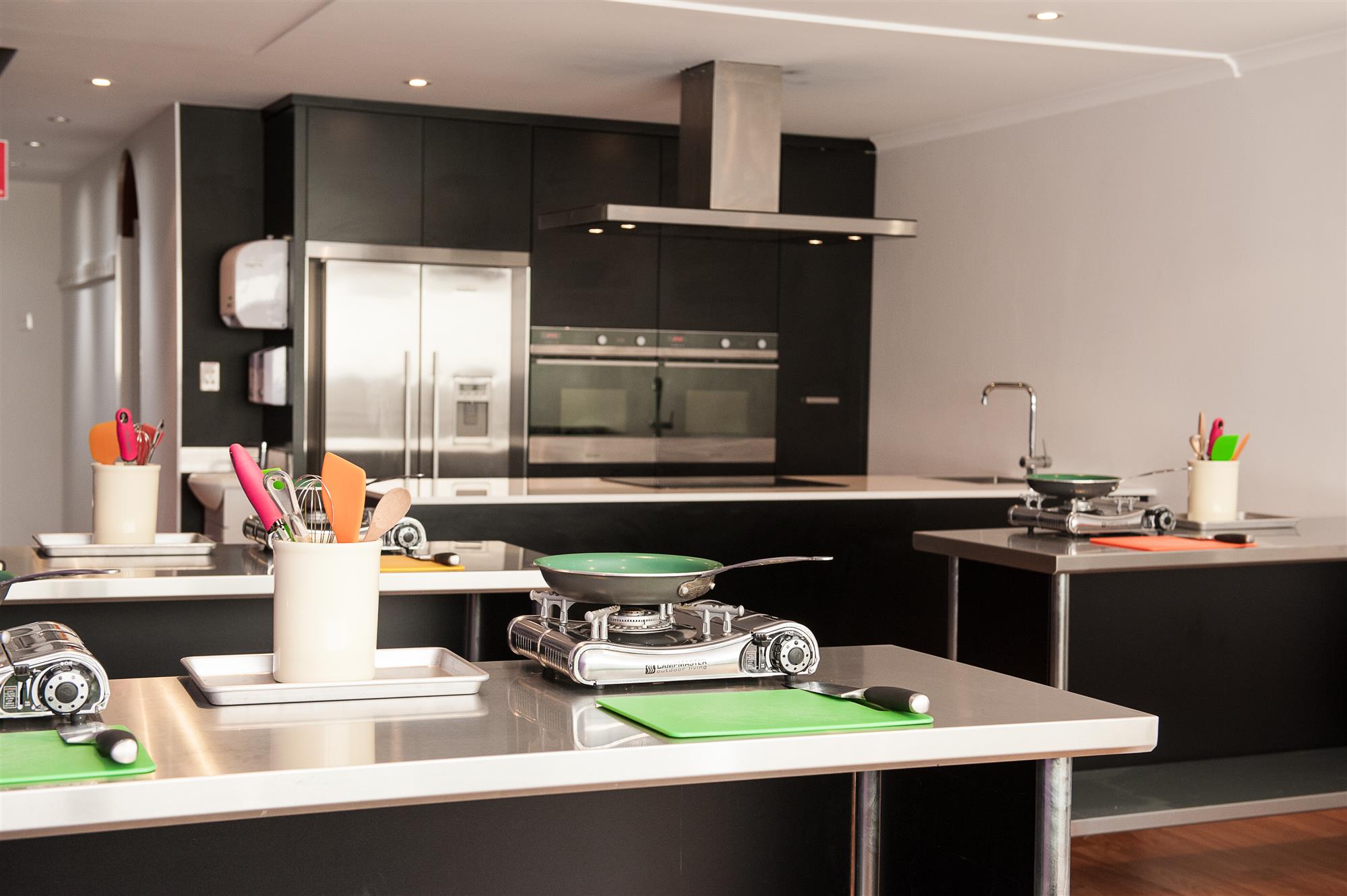 View of cooking classes facing front kitchen area